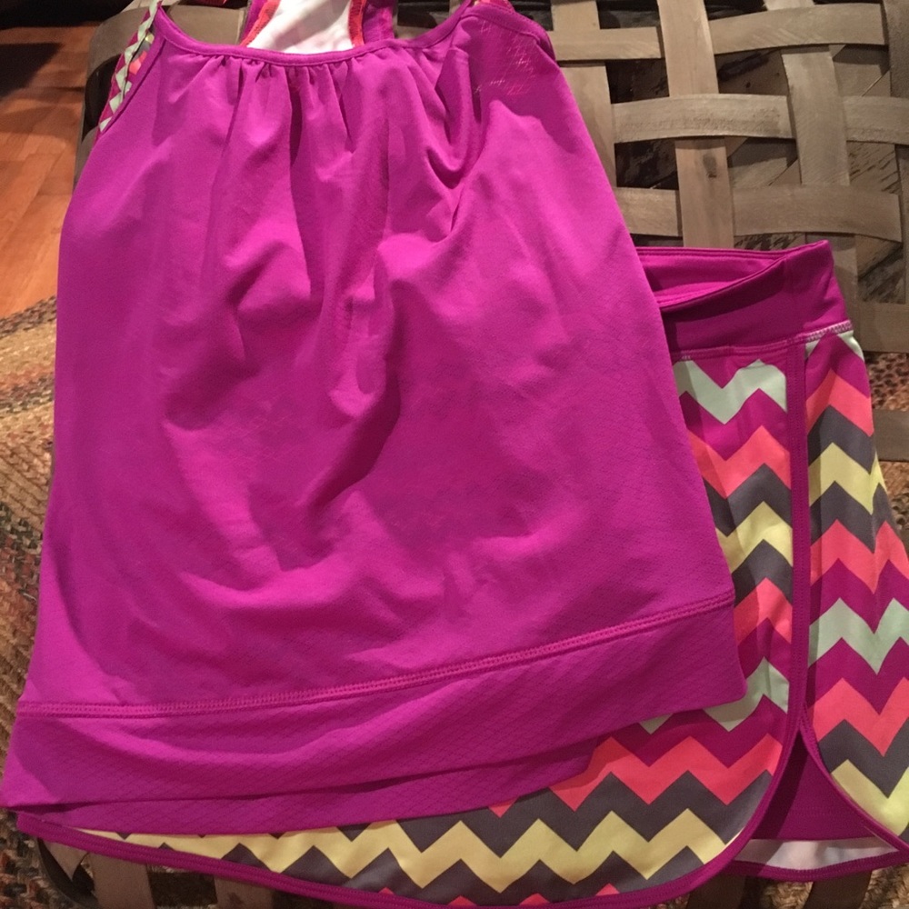 DANSKIN. 2 pc outfit skort and layered tank